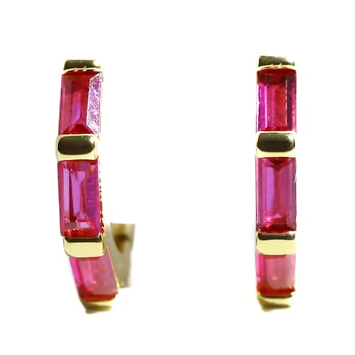 laydown image of Women's Stacked Ruby Huggie Earrings