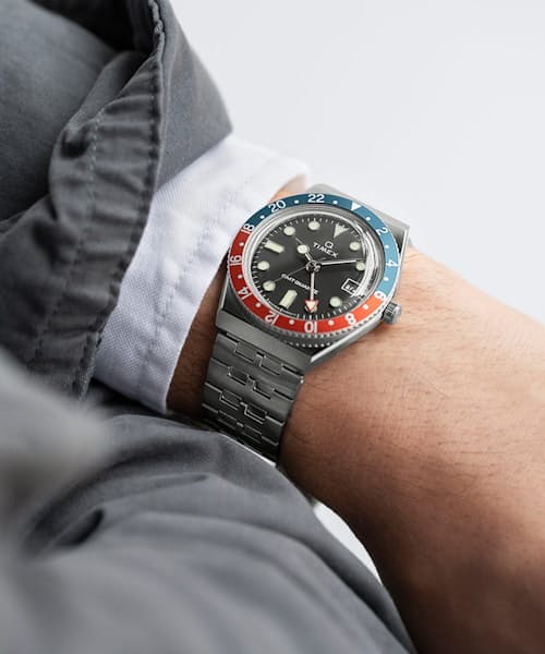 lifestyle image of Q Timex GMT 38mm Stainless Steel Watch