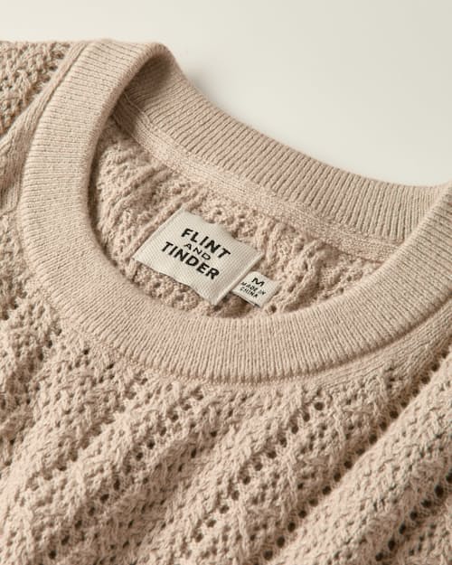 laydown detail image of Open Knit Stitch Crewneck Sweater