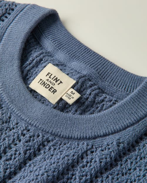 laydown detail image of Open Knit Stitch Crewneck Sweater