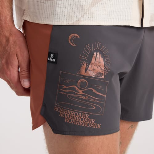 on model image of Alta Run Shorts - 5"