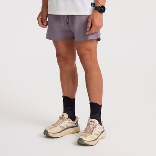 on model image of Alta Run Shorts - 5"