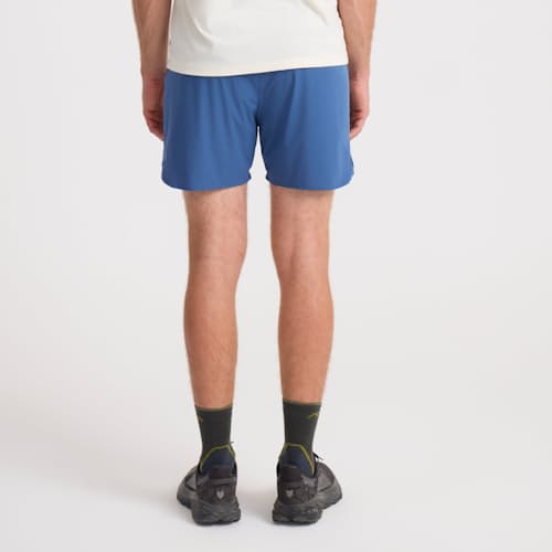 on model image of Alta Run Shorts - 5"
