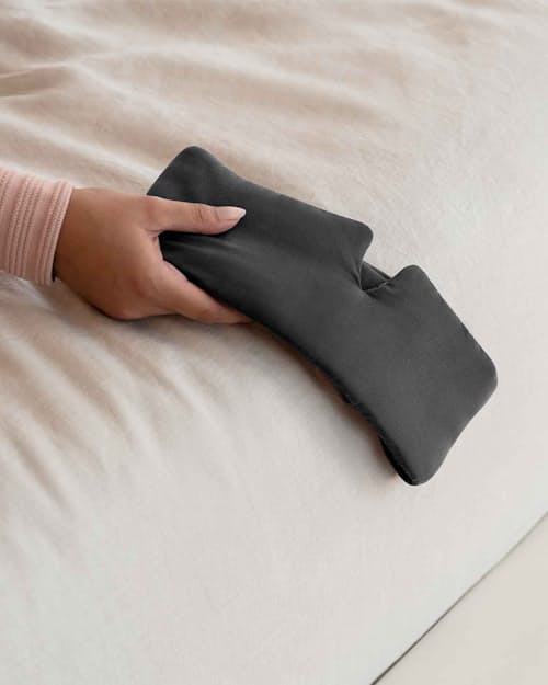 lifestyle image of Weighted Silk Sleep Stone Mask