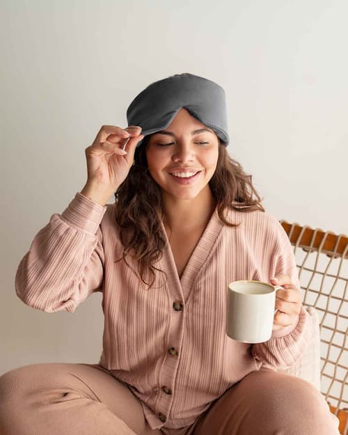 lifestyle image of Weighted Silk Sleep Stone Mask