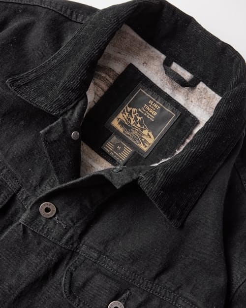 laydown detail image of Flannel-Lined Denim Trucker Jacket