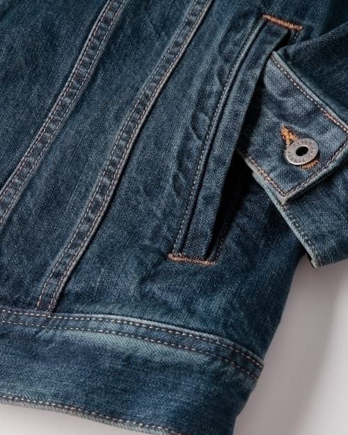 laydown detail image of Unlined Denim Trucker Jacket