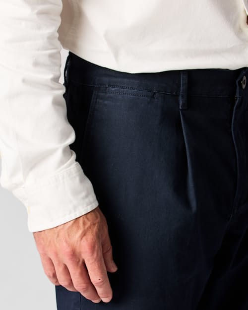 on model image of 365 Pleated Chino Pant