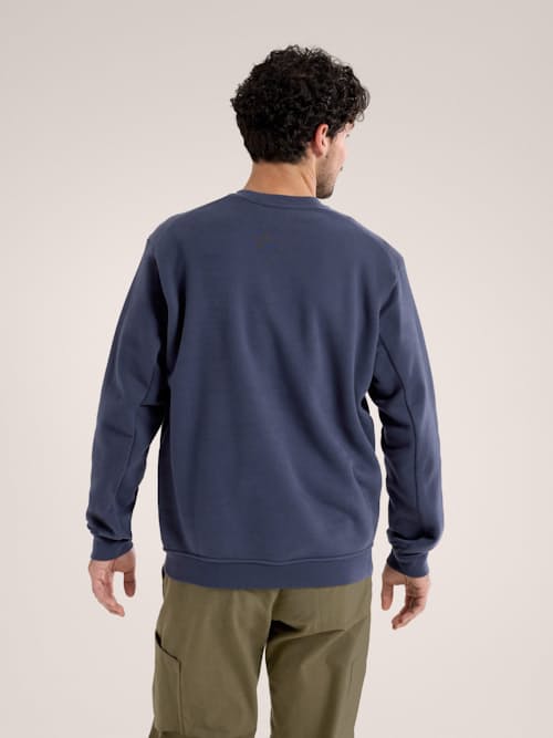 on model image of Emblem Fleece Crew