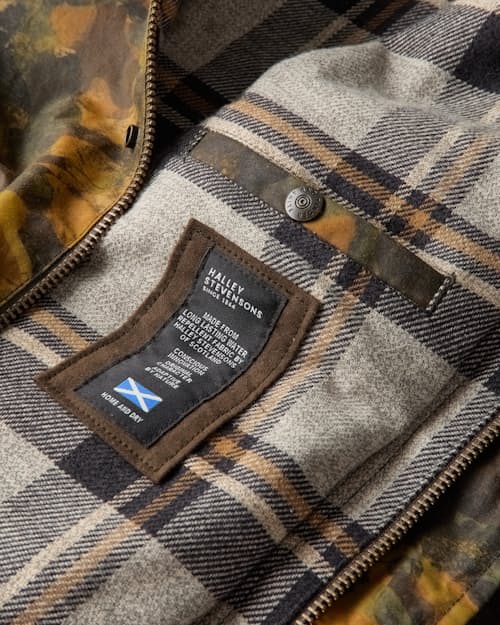 laydown detail image of Flannel-Lined Waxed Hudson Jacket