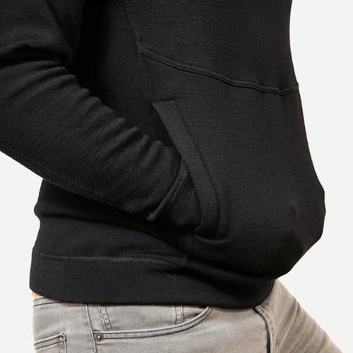 on model image of Cloudbase Merino: Heavy Weather Hooded Mid