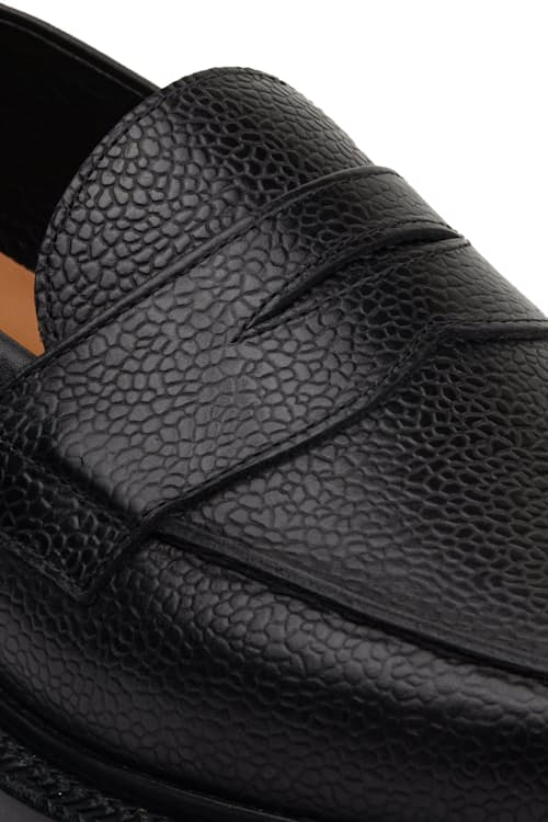 laydown detail image of The Ellis Penny Lug Sole Loafer