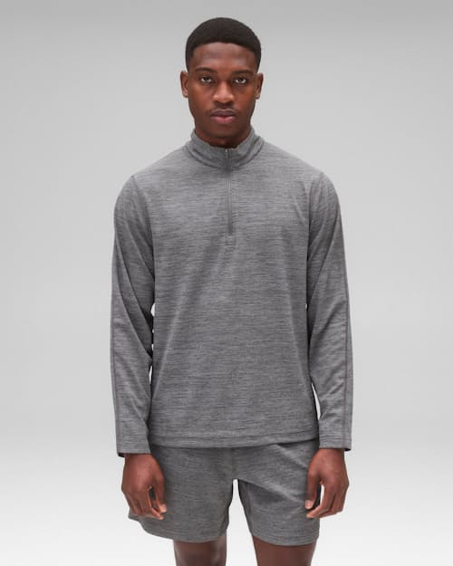 on model image of Solotex Mesh Tiebreak Quarter Zip