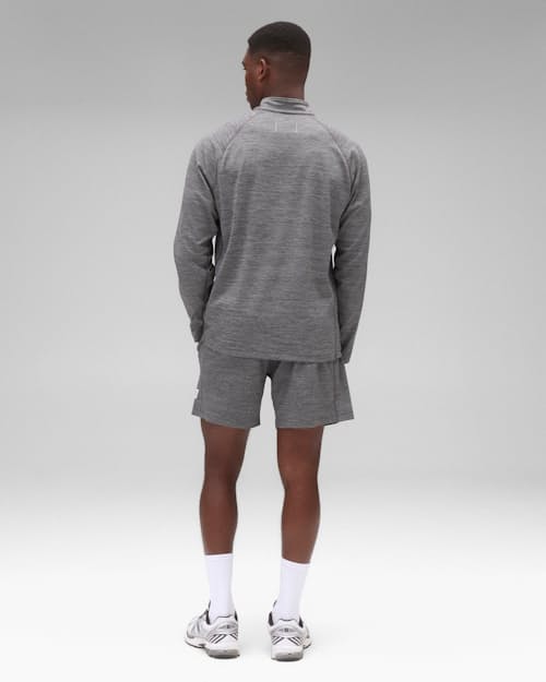 on model image of Solotex Mesh Tiebreak Quarter Zip