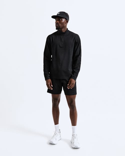 on model image of Solotex Mesh Tiebreak Quarter Zip
