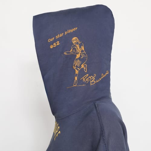 on model image of Varsity Hoodie