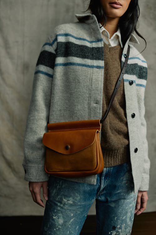 on model image of Women's Suede Convertible Field Bag