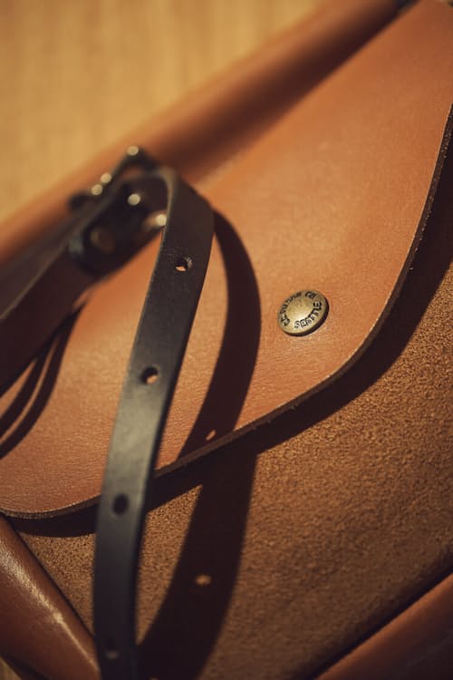 lifestyle image of Women's Suede Convertible Field Bag