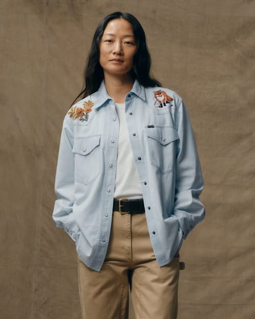 on model image of Women's Embroidered Chambray Shirt