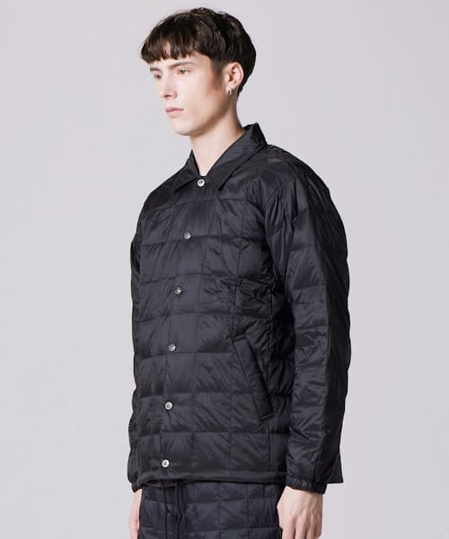on model image of Down Coach Jacket