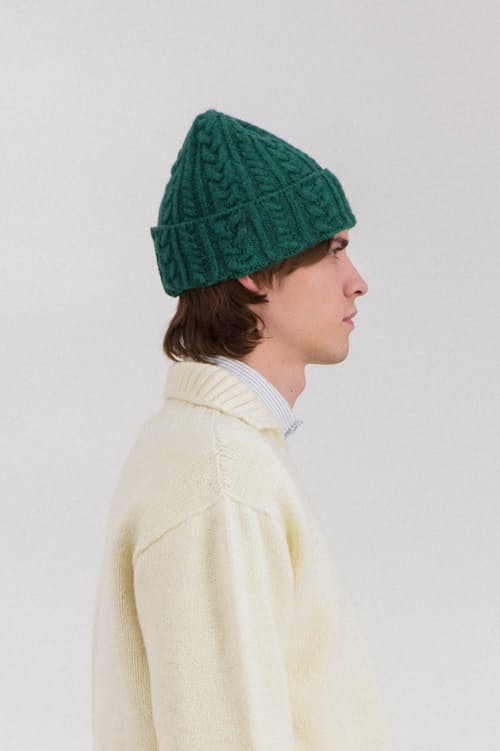 on model image of Cable Festival Hat