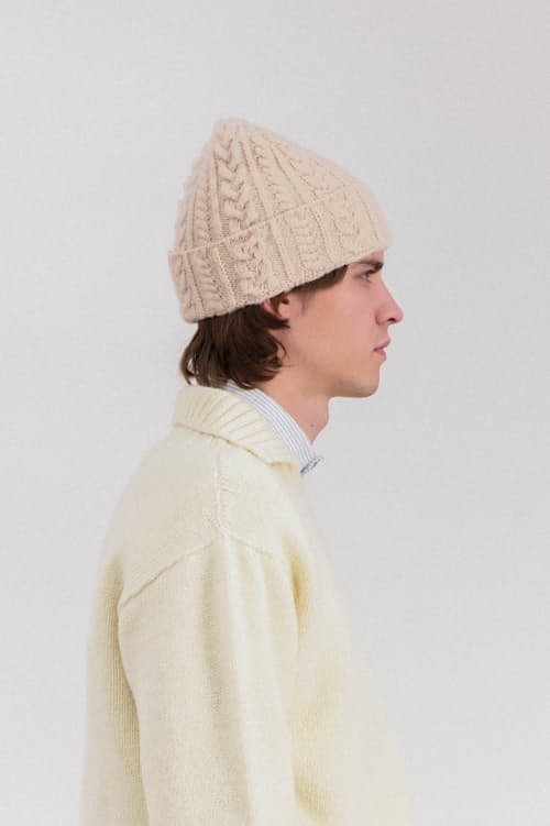 on model image of Cable Festival Hat