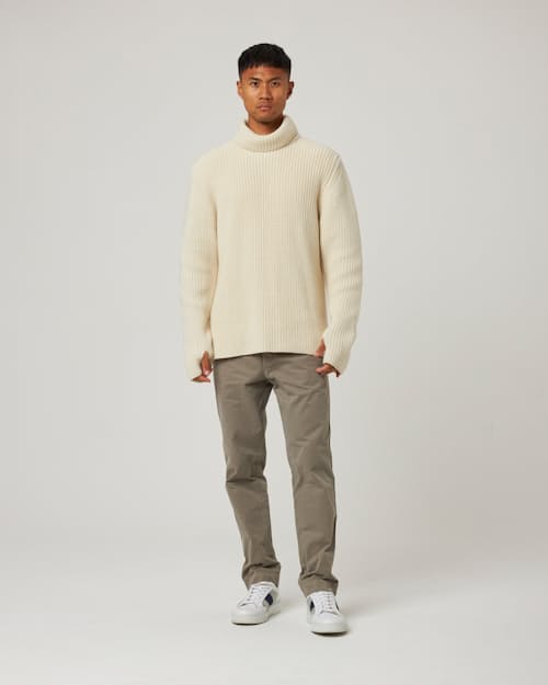 on model image of Wilkinson Turtleneck Sweater