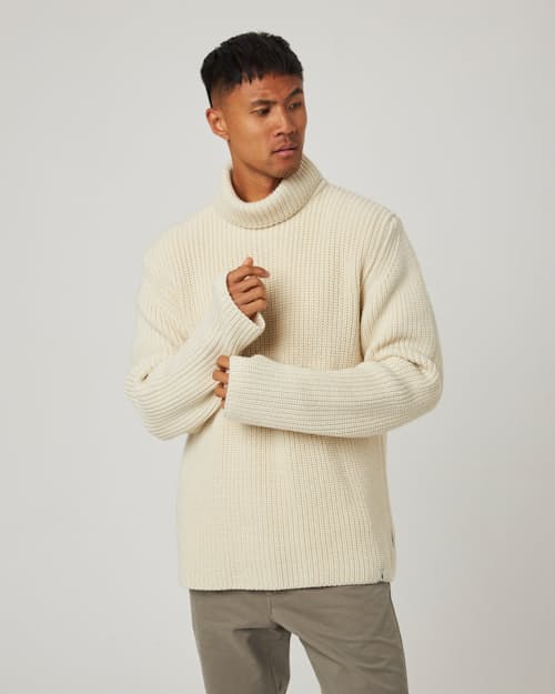 on model image of Wilkinson Turtleneck Sweater