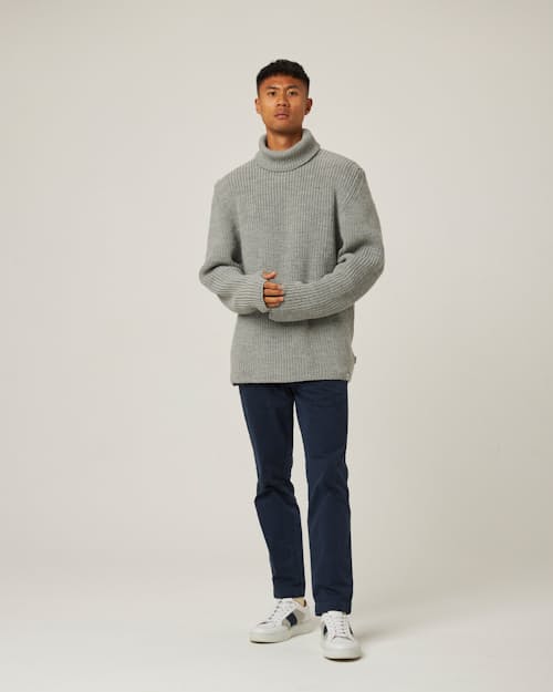 on model image of Wilkinson Turtleneck Sweater