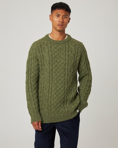 on model image of Hudson Aran Sweater