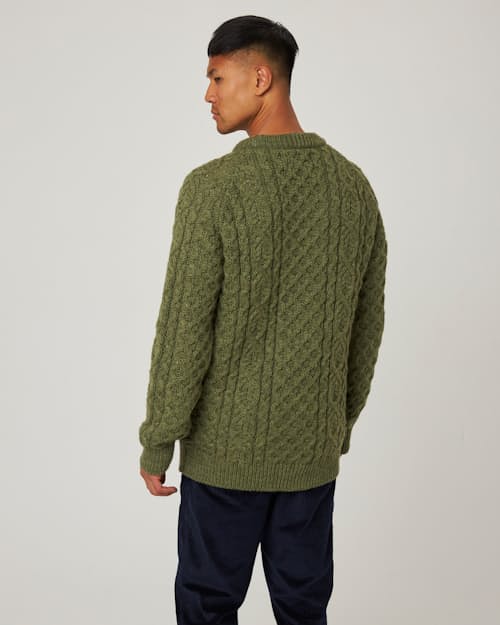 on model image of Hudson Aran Sweater