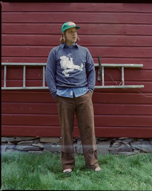 lifestyle image of Wayne Raglan Sleeve Sweatshirt