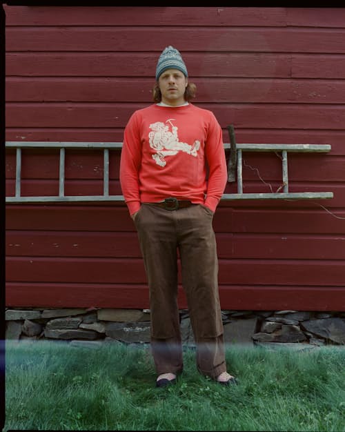 lifestyle image of Wayne Raglan Sleeve Sweatshirt