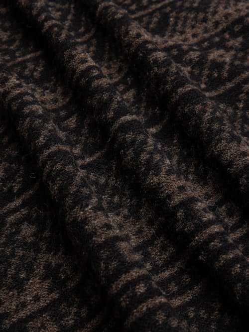 laydown detail image of Neist Herringbone Wool Cardigan