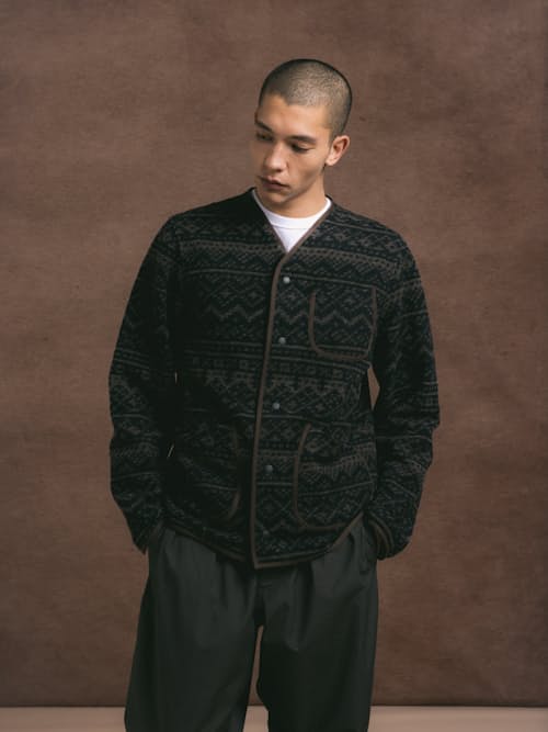lifestyle image of Neist Herringbone Wool Cardigan