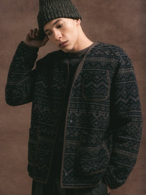 lifestyle image of Neist Herringbone Wool Cardigan