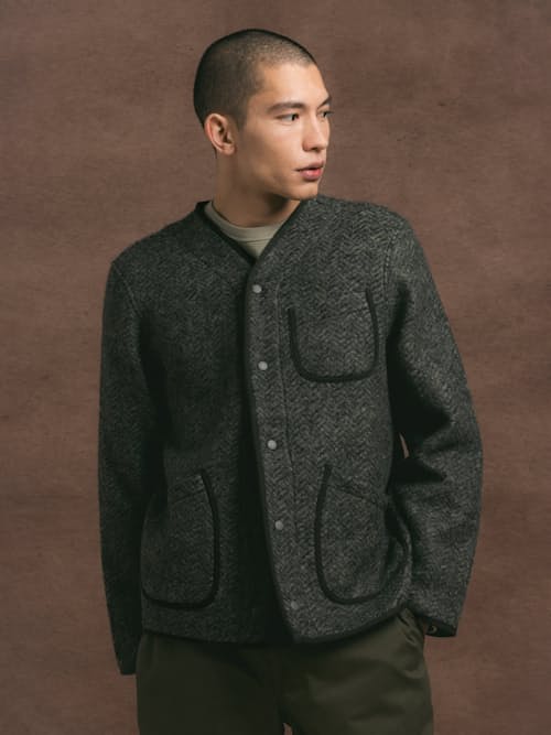 lifestyle image of Neist Herringbone Wool Cardigan