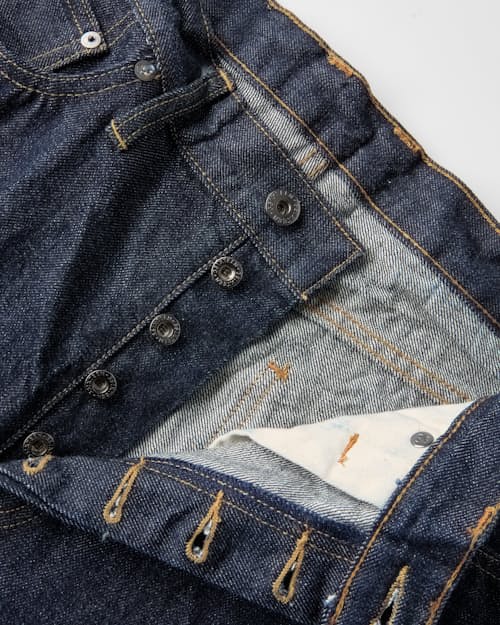 laydown detail image of Classic Tapered Selvedge Denim Jeans