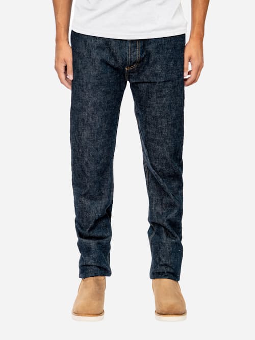 on model image of Classic Tapered Selvedge Denim Jeans