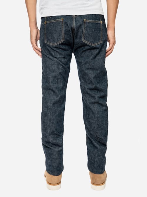 on model image of Classic Tapered Selvedge Denim Jeans