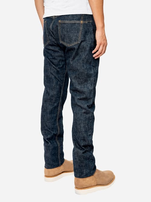 on model image of Classic Tapered Selvedge Denim Jeans