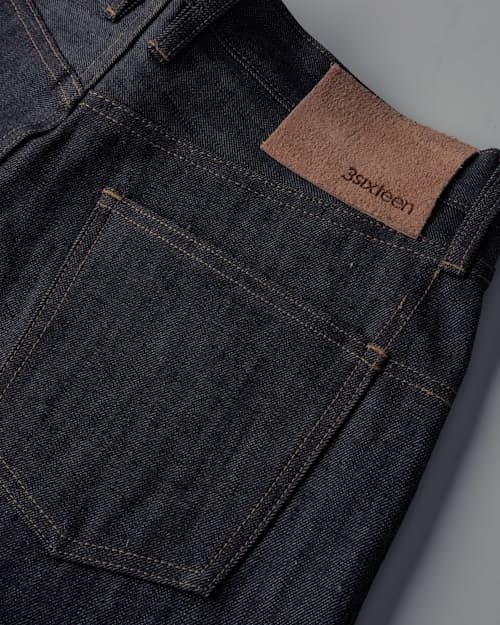 laydown detail image of Relaxed Straight Selvedge Denim Jeans