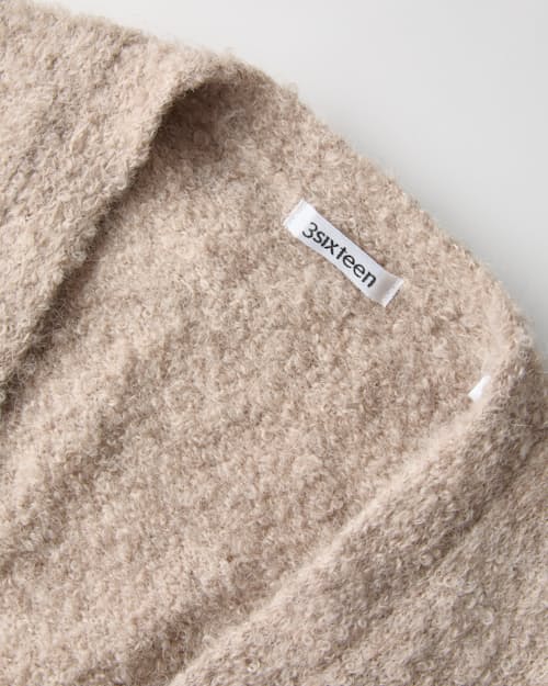 laydown detail image of Boucle Alpaca V-Neck Cardigan