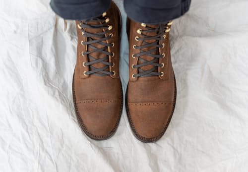 on model image of DB Hunter Cap Toe Boot