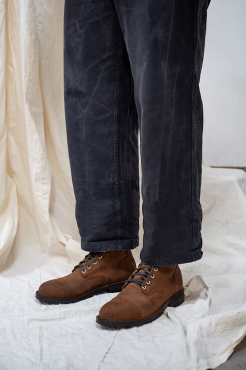 on model image of DB Hunter Cap Toe Boot