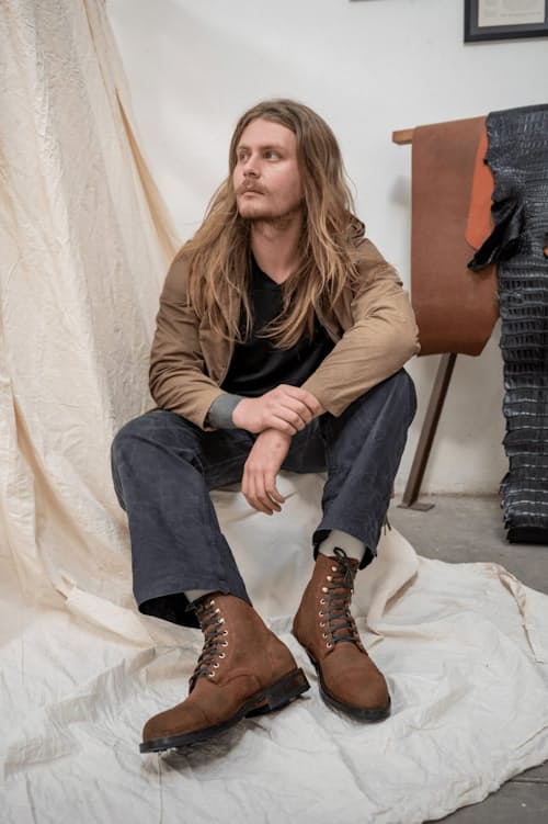 lifestyle image of DB Hunter Cap Toe Boot
