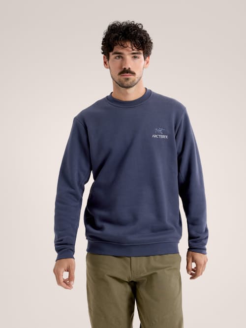 on model image of Emblem Fleece Crew
