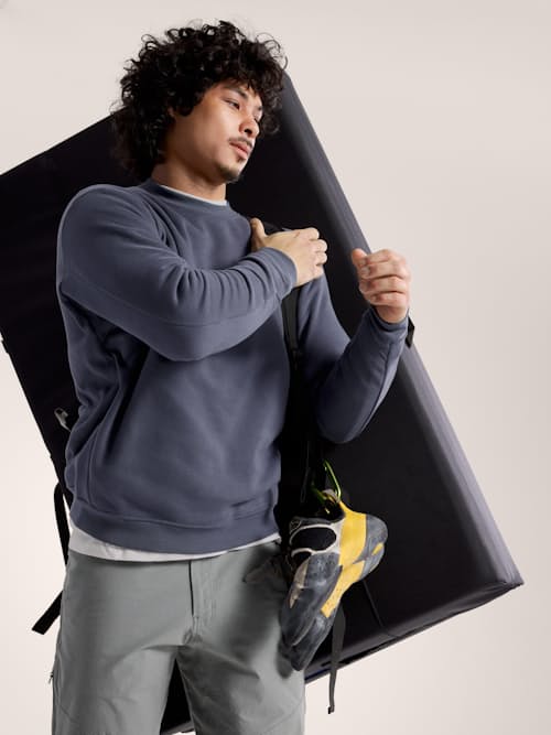 on model image of Emblem Fleece Crew