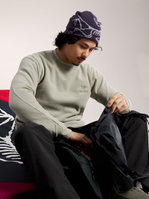 on model image of Emblem Fleece Crew
