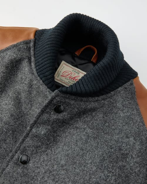 laydown detail image of Leather and Wool-Blend Varsity Bomber Jacket